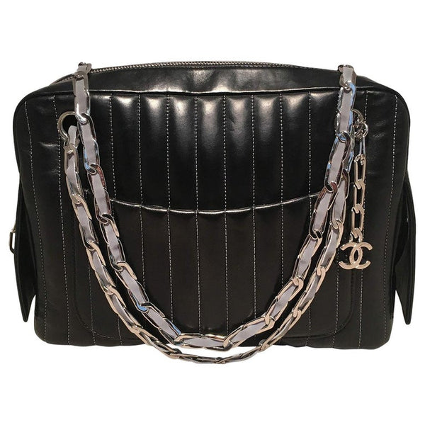 Chanel Mademoiselle Ligne Vertical Quilted Black Leather Camera Bag –  Ladybag International