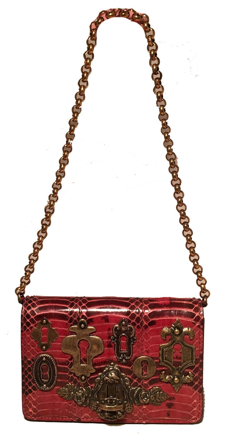 Dolce and Gabbana Maroon Snakeskin Keyhole Clutch Bag